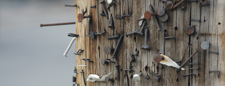Attaching Signs to Utility Poles Presents Safety Hazards – And It’s Illegal